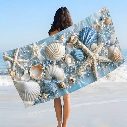 1条贝壳印花沙滩巾，柔软舒适轻便，适合旅行、游泳、潜水、冲浪、瑜伽、露营等活动，是沙滩用品的理想之选。