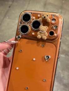 Ốp lưng điện thoại hình gấu 3D dễ thương đính ngọc trai cho iPhone 17 Pro Max/17 Pro/17, ốp lưng đính đá hình trái tim, tương thích với iPhone 16 Pro Max/16 Pro/16, 15 Pro Max, 14 Pro Max, 13 Pro Max, 12, 11, phụ kiện điện thoại thời trang dành cho nữ. - Gấu nâu nhạt - Xem 2