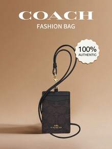 Coach Portaidentificación vertical de cuero genuino con ventana transparente para identificación, 2 ranuras para tarjetas de crédito y cordón desmontable - Marrón - Ver 1