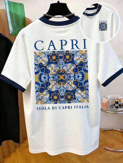 Áo thun in hình phong cách "City Boy" Mỹ cổ điển với họa tiết hoa, chữ in và viền tương phản.