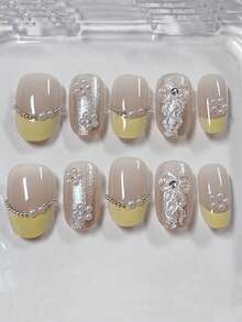 10片手工短椭圆形美甲贴片，黄色法式珍珠蝴蝶结装饰，简约奢华风格，镶嵌细小水钻，可拆卸重复使用，柠檬黄欧美时尚短款美甲贴片，适合夏季、派对、法式美甲、美式风格，坚固耐用，高品质美甲，时尚美甲，爱美人士、时尚达人的理想之选。 - 黃色 - 查看 9