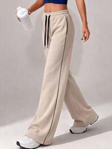 Dambyxor med dragsko och vardagskläder - Champagne - Visa 1