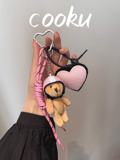 1 móc khóa hình gấu đội mũ bảo hiểm dễ thương, thiết kế tối giản, phù hợp để gắn vào chìa khóa xe, phụ kiện hoặc làm quà tặng giáo viên.