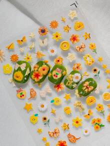1 张可爱黄色小鸭、阳光、花卉美甲贴纸，包含黄色小鸭、橙色小猫、泰迪熊、企鹅、小鸟、向日葵、雏菊、橙花、星星、蝴蝶结、冰棒、橙片、樱桃、格子爱心、纸飞机、蝴蝶和手写英文文字等可爱图案，风格欢快、卡通，充满秋日阳光气息，适合休闲外出、周末旅行和与家人共度美好时光。 - 彩色 - 查看 3