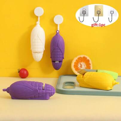 Selección No. 11 de VeyohomeyCo: Juego de 2 piezas (Afilador de cuchillos + Gancho sin rastro) Piedra de afilar con forma de maíz, afilador de cuchillos de cocina en miniatura con forma de maíz, afilador portátil de cuchillos de cocina y cuchillos de fruta, accesorio de cocina creativo y lindo para el hogar