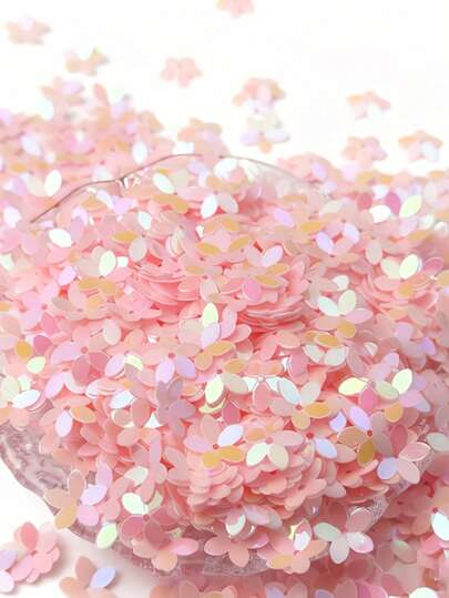 50克/1000颗粉色10毫米凹面梅花五指花闪光亮片纸屑，PVC材质，彩色闪光亮片纸屑，适用于耳环、花环、活动策划，是秋季、冬季、母亲节及各种场合的理想之选。