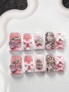 10件套甜美个性化美甲套装，包含凝胶指甲、樱桃、丝带蝴蝶结、镂空星星、魔法棒、水钻和美甲装饰品，白色和粉色指甲油，奢华风格，附赠美甲工具（1个果冻贴纸+1个指甲锉），提供3种尺寸，适合杏仁形、鸭嘴形、棺材形指甲，适用于派对、日常佩戴、约会、工作等场合。 - 彩色 - 查看 18