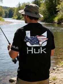 Huk American Flagfish Pattern Fishing T-Shirt, Vintage Niche Round-Neck Fishing T-Shirt, Outdoor T-Shirt, Camping, Hiking, Fishing Enthusiast T-Shirt, Featuring Original Fishing Gear Brand Logo, Lure Bait, Trout, Bass, American Patriotic Flag, Fish Hook Theme Pattern, Vintage Retro Texture, Paired With Front Chest Logo, Cuff Printing, Back Font And Large Back Pattern Design, Black Round-Neck Casual Style, Made Of Soft And Breathable Cotton Blended Fabric. Suitable For Fishing Enthusiasts, Fly Fishing Enthusiasts, Outdoor Enthusiasts And Patriotic Fishing Groups, Suitable For Fishing Trips, Camping Hiking, Outdoor Leisure And Daily Wear. This Series Combines Tough Retro Style With Exclusive Original Fishing Brand Elements, Meeting The Diverse Personalized Dressing Needs In Outdoor Fishing Scenarios. Men's Summer Fun T-Shirt, A Gift For Friends, A Gift For A Father Who Loves Fishing - Black - View 2