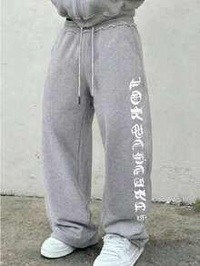 男士休闲运动裤，宽松直筒裤型，垂感好，居家休闲和户外活动皆宜。情侣送礼佳品。100% 涤纶面料，抽绳腰带方便调节。多种颜色可选。春季款 - 淺灰色 - 查看 9