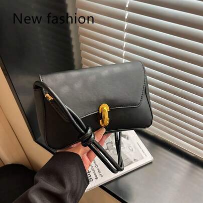 新款时尚女士黑色皮革单肩包，配金色锁扣，优雅百搭，适合日常通勤和休闲外出。