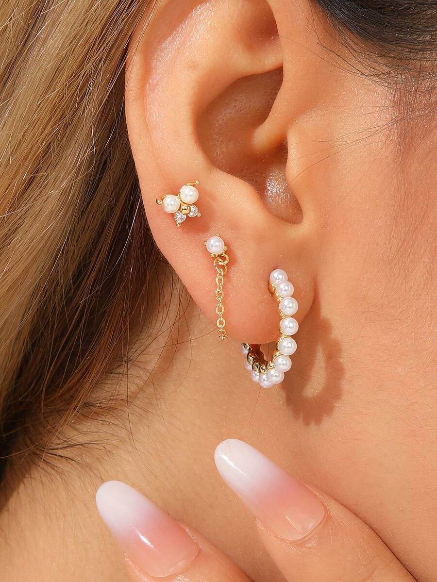 1 Set de pendientes elegantes con diseño de nicho personalizado con perlas, estilo europeo y americano. Conjunto de pendientes de mariposa con borlas de perlas, delicados y apropiados para uso diario. - geometría - Ver 1