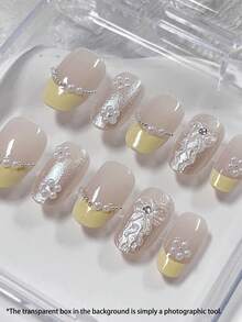 10片手工短椭圆形美甲贴片，黄色法式珍珠蝴蝶结装饰，简约奢华风格，镶嵌细小水钻，可拆卸重复使用，柠檬黄欧美时尚短款美甲贴片，适合夏季、派对、法式美甲、美式风格，坚固耐用，高品质美甲，时尚美甲，爱美人士、时尚达人的理想之选。 - 黃色 - 查看 3
