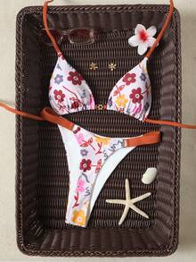 Bộ bikini nữ gợi cảm hở lưng, họa tiết hoa, dây buộc bên hông, chất liệu co giãn cao, thích hợp cho kỳ nghỉ hè ở bãi biển. - Nhiều màu - Xem 1
