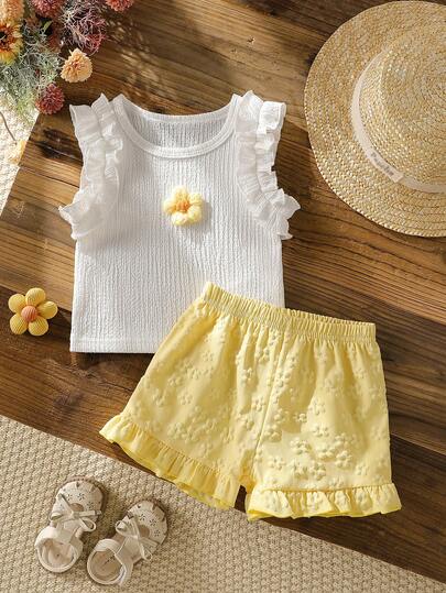 Bộ đồ 2 món dễ thương và thanh lịch cho bé gái, gồm áo vest cổ tròn tay bồng họa tiết hoa và quần short viền bèo in hoa, thích hợp cho mùa xuân/hè, mặc hàng ngày, dự tiệc và đi chơi.