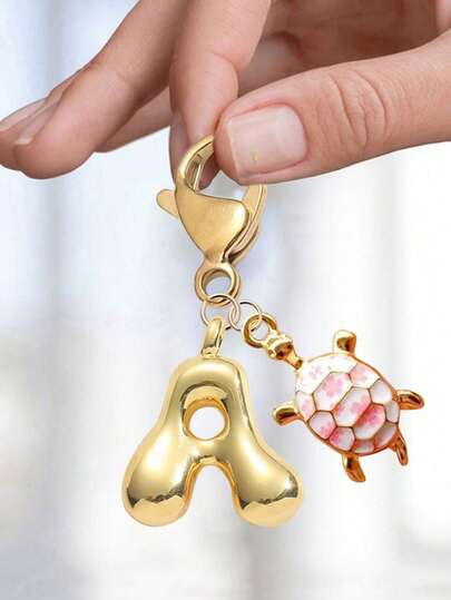 1 süße Schildkröten-Tier-Anhänger Schlüsselanhänger mit Bubble-Buchstaben, süßer Halsketten-Anhänger, Tasche Anhänger - Glücksbringer Kristall-Anhänger, Buchstaben Buchstaben A-Z, glänzender Legierung Tasche und Rucksack Anhänger - perfektes Geschenk für Geburtstage und besondere Anlässe, Schlüsselanhänger Ring Tasche Rucksack Anhänger Auto Anhänger Geschenk für Damen und Mädchen, Geldbörse und Handtasche Accessoires.