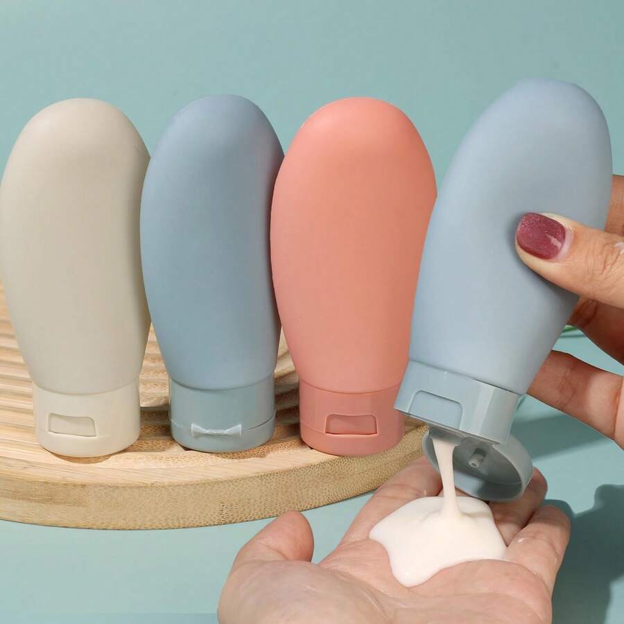 Bộ 1/3 chai du lịch bằng silicon mềm mại, dung tích 60ml, dễ thương; chống rò rỉ, có thể tái sử dụng, thích hợp đựng sữa dưỡng thể, dầu gội và các sản phẩm chăm sóc da. Lý tưởng cho du lịch, tập gym và các chuyến công tác, dùng được cho cả nam và nữ - hoàn hảo cho hành lý xách tay và kỳ nghỉ. Trang trí nhà cửa cho năm học mới, đồ dùng gia đình, đồ dùng cần thiết khi đi du lịch, phụ kiện phòng tắm, quà tặng Ngày của Mẹ.