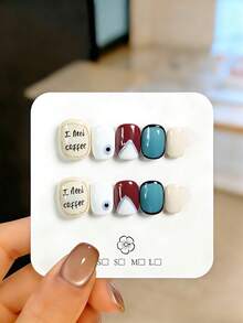 10片手工制作的短款按压式假指甲（可佩戴），既是美甲用品又是装饰品。设计特色包括手写英文短语“我需要咖啡”、手绘猫眼图案、白色V形法式尖角和混合色渐变效果。 - 彩色 - 查看 13