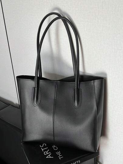 简约实用通勤手提包，底部铆钉设计，优质PU材质，大容量，适合日常使用和学生使用。