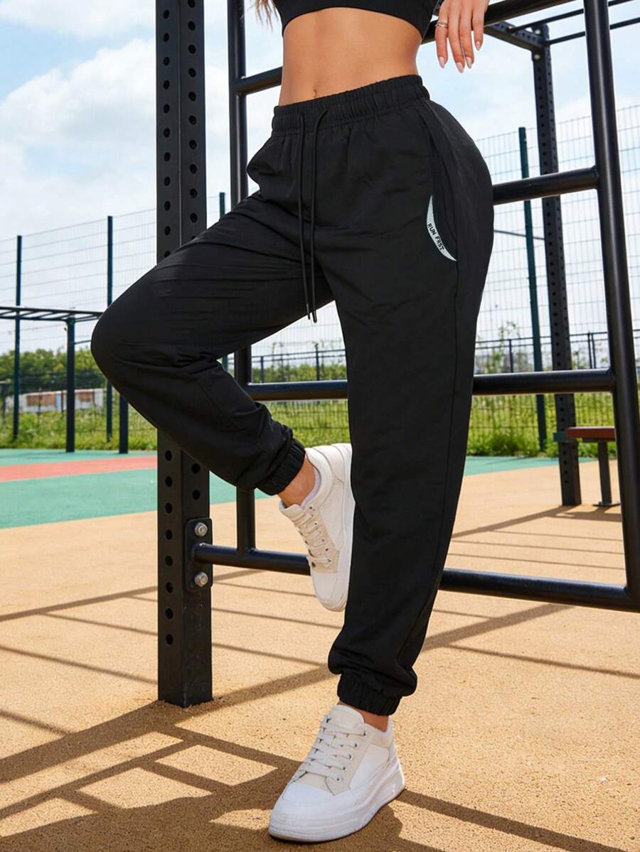 女士印花口袋慢跑裤 - 柔软舒适的运动休闲裤，适合户外跑步、瑜伽和旅行 - 黑色 - 查看 1