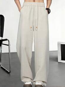 男士杏色亚麻质感抽绳直筒裤，柔软透气面料，适合休闲、度假、夏季及日常通勤，复古绅士风格 - 杏色 - 查看 11