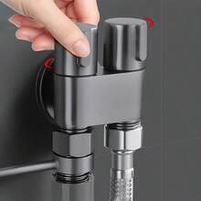 Stainless Steel Triangle Valve With One Inlet And Two Outlets, Equipped With A Spray Gun For Enhanced Flushing, Along With A Faucet. - A - View 5