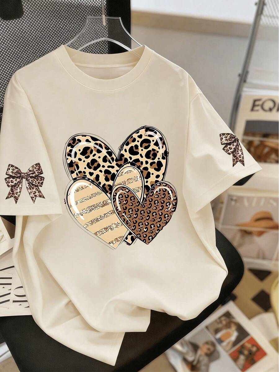 Plus Size Women's Casual Heart-Shaped Leopard Print Round Neck T-Shirt, Mother's Day Gift; Gift For Mom; Graduation Short Sleeve Shirt; Back To School Outfit; Graduation Ceremony; Female Teacher Attire; Summer Clothing For Family And Friends. Suitable For Daily Wear, Outdoor, Festivals, Beach, Parties, School, Music Festivals, Vacations, Commuting And Outings - Apricot - View 1