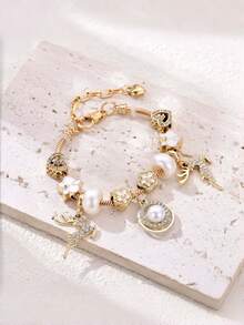 1 chiếc trang sức nữ thời trang và đa năng, hàng mới về, vòng tay charm hình bướm lan đính ngọc trai và đá quý sang trọng - Trang sức nữ cao cấp, phù hợp cho đeo hàng ngày và dự tiệc. - Nhiều màu - Xem 2