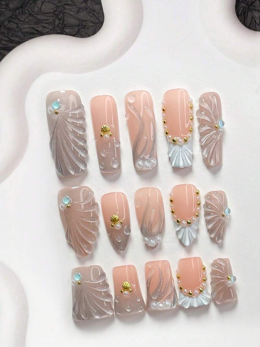 10pcs Ocean Gradient Style Manicure Set, Including Gel Nail Kit, Blue Rhinestones, Shell Nail Decorations, Line Nail Art Decor, White Nail Polish, Mermaid Shell Style, With Nail Tools (1 Jelly Sticker + 1 Nail File). Available In 3 Sizes Suitable For Almond, Duck Mouth, And Coffin Nails. Suitable For Parties, Daily Wear, Parties, Photography, Spring/Summer Dates, Office, And More. - 彩色 - 查看 1