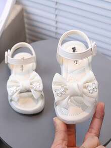 1 đôi sandal đính nơ và đá cho bé gái, màu trắng, đế mềm chống trơn trượt kiểu công chúa. - Màu be - Xem 4