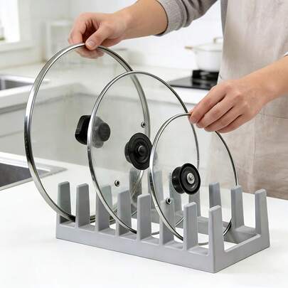 多功能置物架，可作锅盖架、碗碟架、勺子架、砧板架、书籍收纳架，方便存放和沥干锅盖和勺子，适用于现代厨房、书房，是厨房收纳整理的理想之选。这款置物架可分隔多个碗碟，是创意桌面书架或碗碟分隔架的理想之选。