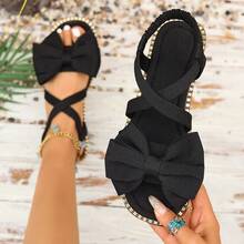 女士黑色蝴蝶结平底凉鞋，新款夏季时尚沙滩度假露趾交叉拖鞋 - 黑色 - 查看 12