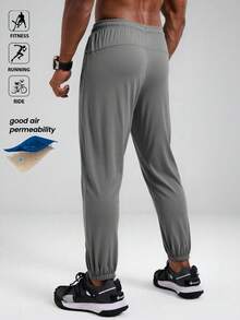 Pantalones deportivos ligeros para hombres, pantalones de chándal casuales de verano para entrenamiento de fitness y carrera con cintura con cordón, bolsillos con cremallera y puños en los tobillos, primavera - Gris - Ver 6