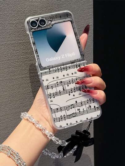 1个时尚磨砂PC材质简约可爱全屏Note元素折叠手机壳，搭配同色手环，可保护手机并防止跌落，适用于：三星Galaxy Zflip 3/Zflip 4/Zflip 5/Zflip 6/Zflip 7/ Find N3 Flip/ Razr 50 Ultra/ Razr 60 Ultra/ Razr 60/ Razr 50/小米MIX Flip/Galaxy Z Flip7 FE