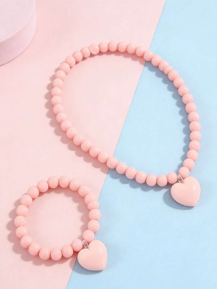 Bộ 2 món trang sức cho bé gái gồm vòng tay mặt dây chuyền hình trái tim dễ thương và dây chuyền đính hạt, thích hợp để đeo hàng ngày, dự lễ hội, làm quà sinh nhật. - Một cỡ - Xem 1