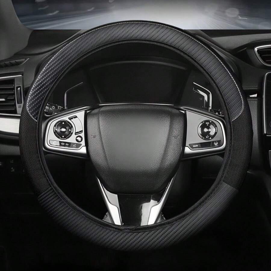 A Steering Wheel Cover Made Of Mesh And Carbon Fiber Faux Leather, Suitable For Most Car Models, Without An Inner Ring, And Usable In All Seasons