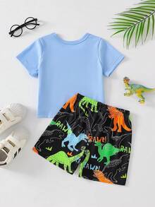 Conjunto de camiseta y pantalones cortos con estampado de dinosaurios que brillan en la oscuridad para niños pequeños - Celeste - Ver 3