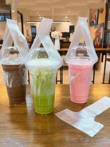 100个T型珍珠奶茶外卖袋 - 便携式饮料杯套，透明塑料杯套带提手，适用于商店外卖、悬挂携带，可盛装咖啡、牛奶、果汁、水、茶、奶昔等饮品。单杯或双杯均可使用。专为咖啡馆、咖啡吧和零售店设计；耐用的外卖饮料容器，是外卖服务、咖啡馆、餐厅和商店的理想之选。 - 彩色 - 查看 2