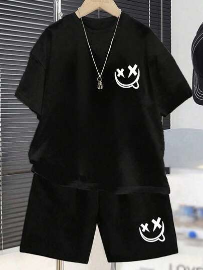 Conjunto casual diario de camiseta de manga corta con cuello redondo y estampado de cara, y pantalones cortos para niño preadolescente