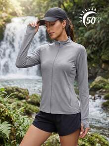 Cavva Áo khoác chống nắng nhẹ UPF 50+ dành cho nữ, áo cardigan dài tay co giãn nhanh khô, chất liệu vải có họa tiết, dáng ôm, tay raglan, túi khóa kéo ẩn, lỗ xỏ ngón cái, thích hợp cho các hoạt động ngoài trời như leo núi, chạy bộ, yoga. - Màu Xám nhạt - Xem 9