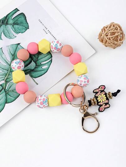 1个波西米亚风串珠手腕钥匙扣，可爱雏菊和马卡龙色，防丢串珠手腕钥匙扣，可用于车钥匙、背包等，用途广泛，是送给妈妈的完美礼物