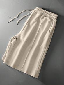 1 chiếc quần short thể thao nam nhẹ, có dây rút, kiểu dáng rộng rãi, thoải mái, đa năng, dễ dàng sử dụng trong thời gian rảnh rỗi, thích hợp cho các chuyến đi biển. - Màu be - Xem 1