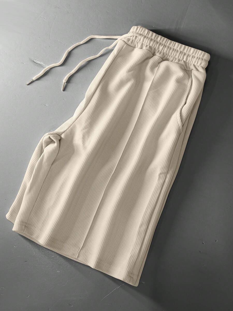 1 chiếc quần short thể thao nam nhẹ, có dây rút, kiểu dáng rộng rãi, thoải mái, đa năng, dễ dàng sử dụng trong thời gian rảnh rỗi, thích hợp cho các chuyến đi biển. - Màu be - Xem 1