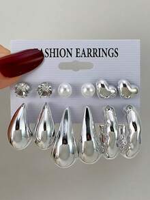 Bộ 12 chiếc khuyên tai kẹp hình trái tim 3D, giọt nước, hình chữ C, hình học bất đối xứng sang trọng, bộ khuyên tai thiết kế tối giản độc đáo cá tính cao cấp bán chạy nhất năm 2026, phù hợp để đeo hàng ngày. - Bạc - Xem 2