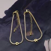 1条18K镀金手链，经典白色锆石A-Z字母链手链，女士礼物 - 金色 - 查看 3