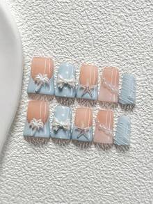 10件套夏日度假风手工美甲套装，包含凝胶美甲套装、3D椰子树、蝴蝶结、海星、珍珠美甲装饰、波点、波浪美甲装饰、蓝色指甲油，甜美优雅的法式风格，附赠美甲工具（1个果冻贴纸+1个指甲锉）。三种尺寸可选，适合杏仁形、鸭嘴形、棺材形指甲。适用于派对、日常佩戴、聚会、拍照、约会、春夏通勤等场合。 - 彩色 - 查看 18
