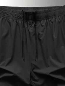 1 chiếc quần short thể thao unisex mùa xuân/hè có túi khóa kéo và dây rút ở eo - màu đen - Xem 3