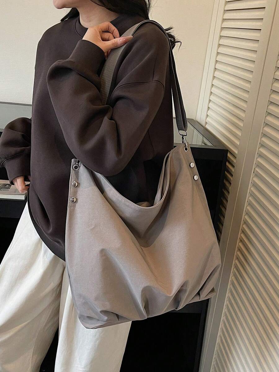 1 件装米色柔软可折叠帆布大容量敞口单肩包，适合女性日常通勤。