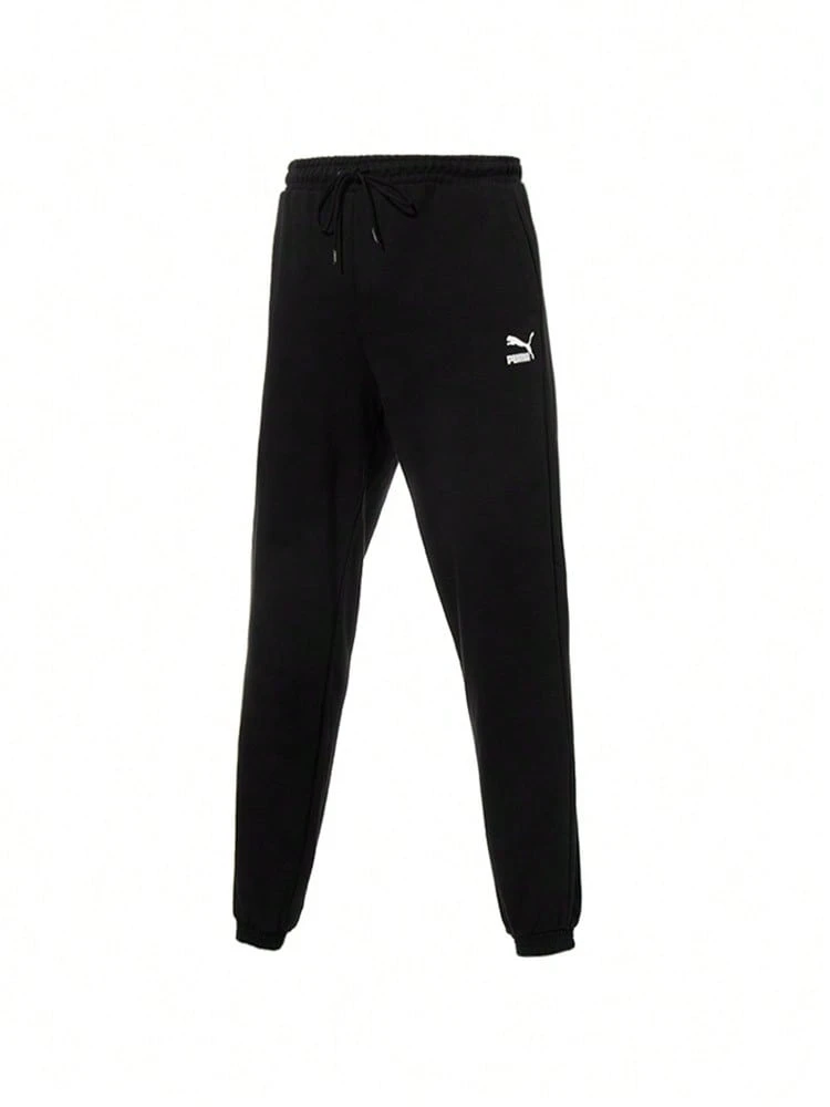 Puma Men's Pants, Sporty Casual Simple Basic Tapered Cuff Long Pants, Jogger Pants, Sweatpants 53311801 - Black - View 1