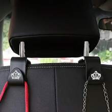 2 móc treo đồ đa năng hình vương miện sáng bóng gắn phía sau ghế xe hơi, móc treo tiện dụng tích hợp sẵn. - 2 móc treo ghế - Xem 10