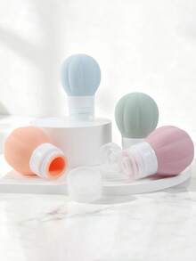 Nuevo set de botellas de viaje recargables de silicona creativas, organizador de contenedores cosméticos de silicona - Ver 5